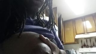 Ebony squeezes milk from her big black boob for Youtube