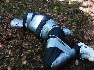 Helpless man bound with tape