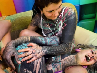 Two tattooed girls get ass fucked by a big dick